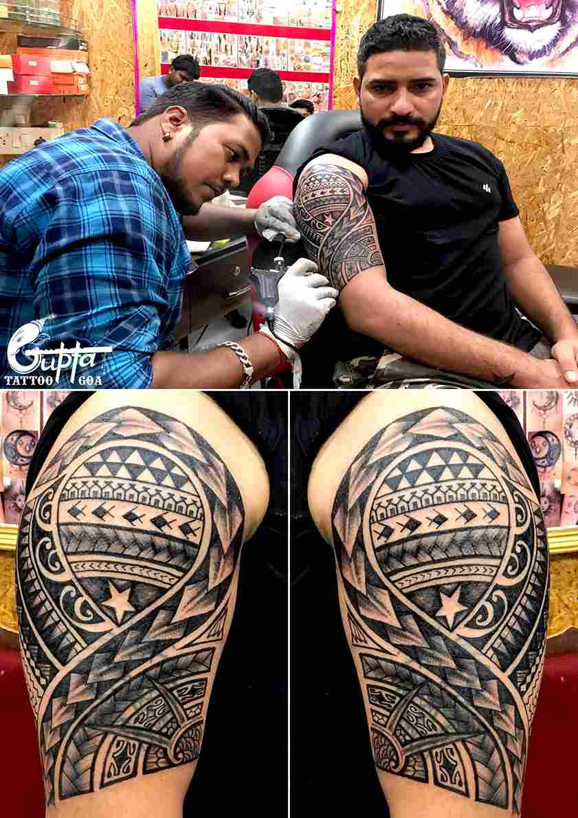 tribal full arm tattoo