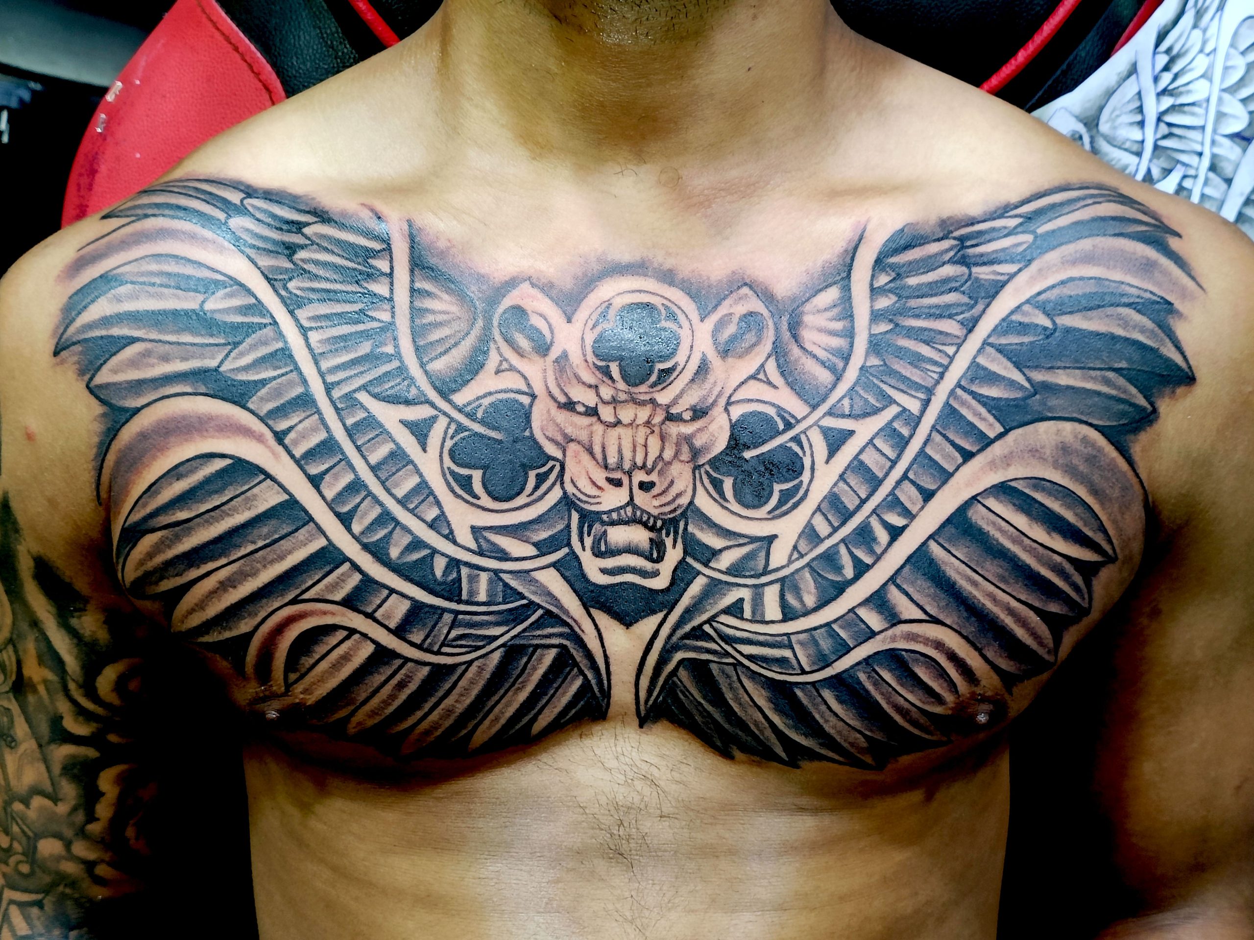 Intricate japanese chest tattoo design with kanjis on Craiyon